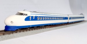 Blue version with small JR lettering. Working chassis by Platz. Six car train.